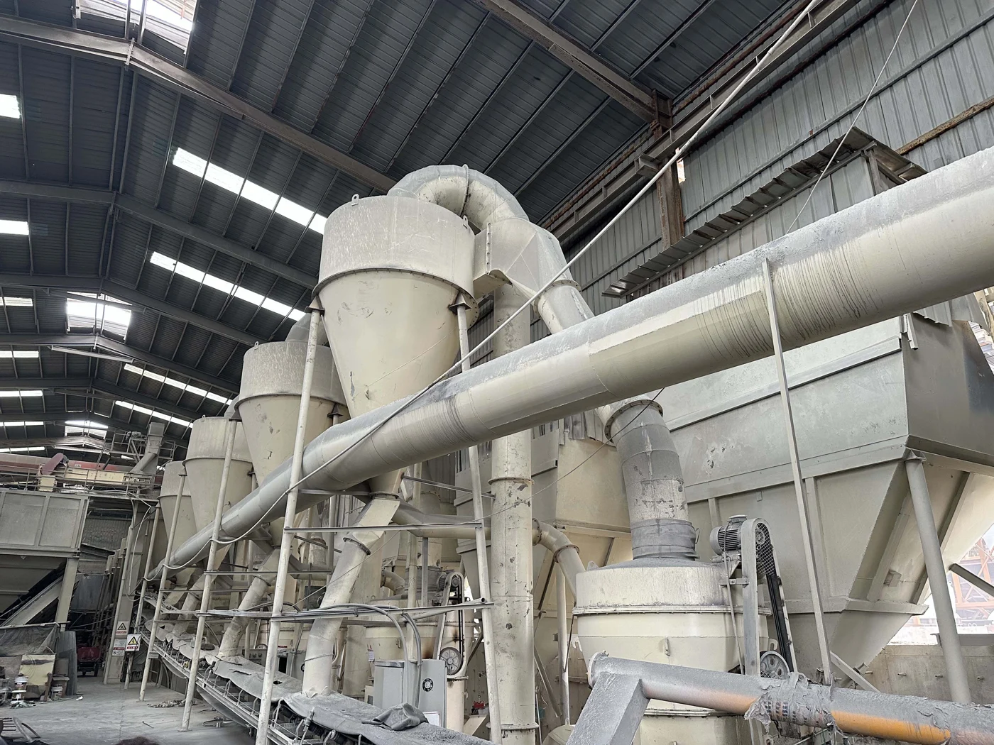 Processing equipment and ductwork inside the LINGSHUAI bentonite production workshop